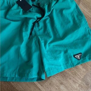 Prada Men's Vibrant Aqua Swim Trunks